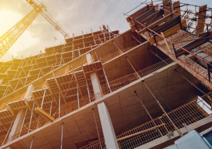 Building construction site with scaffolding