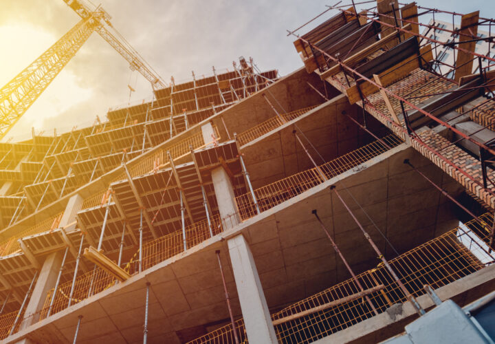 Building construction site with scaffolding